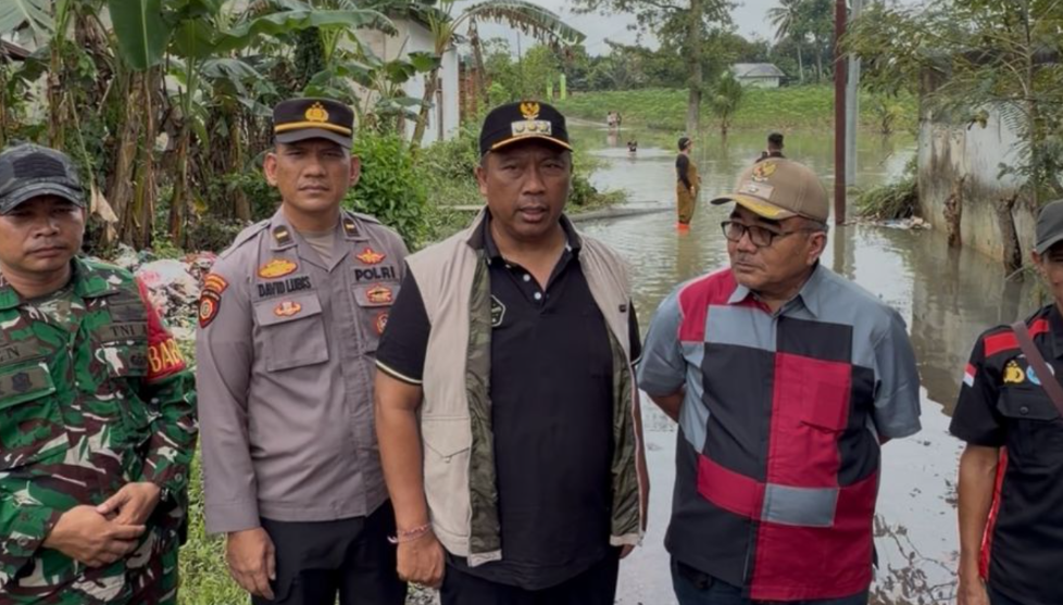 Plt Bupati Lampung Tengah Tinjau Banjir di Kota Gajah, Pastikan Penanganan dan Bantuan Cepat