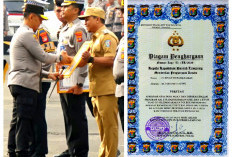 Bupati Pringsewu Raih Penghargaan dari Kapolda Lampung