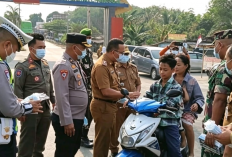 Antisipasi Abu Vulkanik GAK, Polres Mesuji Bagikan 1.270 Masker di 16 Titik